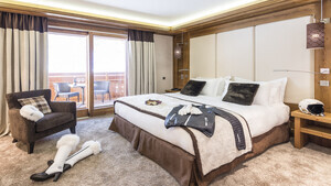Chambre d'hôtel avec lit double et balcon - Hôtel de charme à Méribel - Le Kaïla